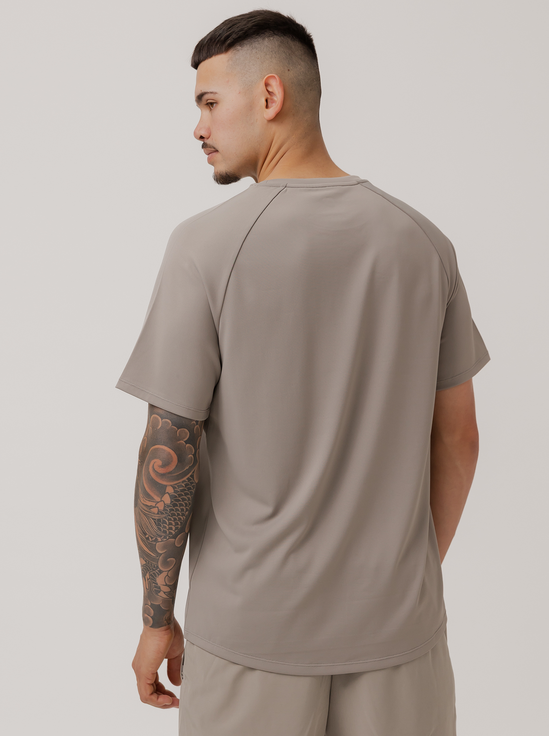 Move Logo Performance Tee in Cinder